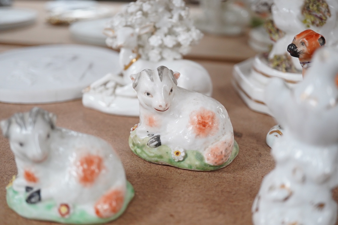 A rare Staffordshire porcelain model of an eagle or vulture, c.1830-50, and five Derby porcelain models, 1810–30; two recumbent sheep, a pug dog, a deer and a dove, 20cm high
